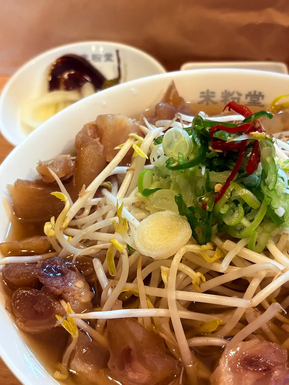 Pho topped generously with scallions and cheongyang chili