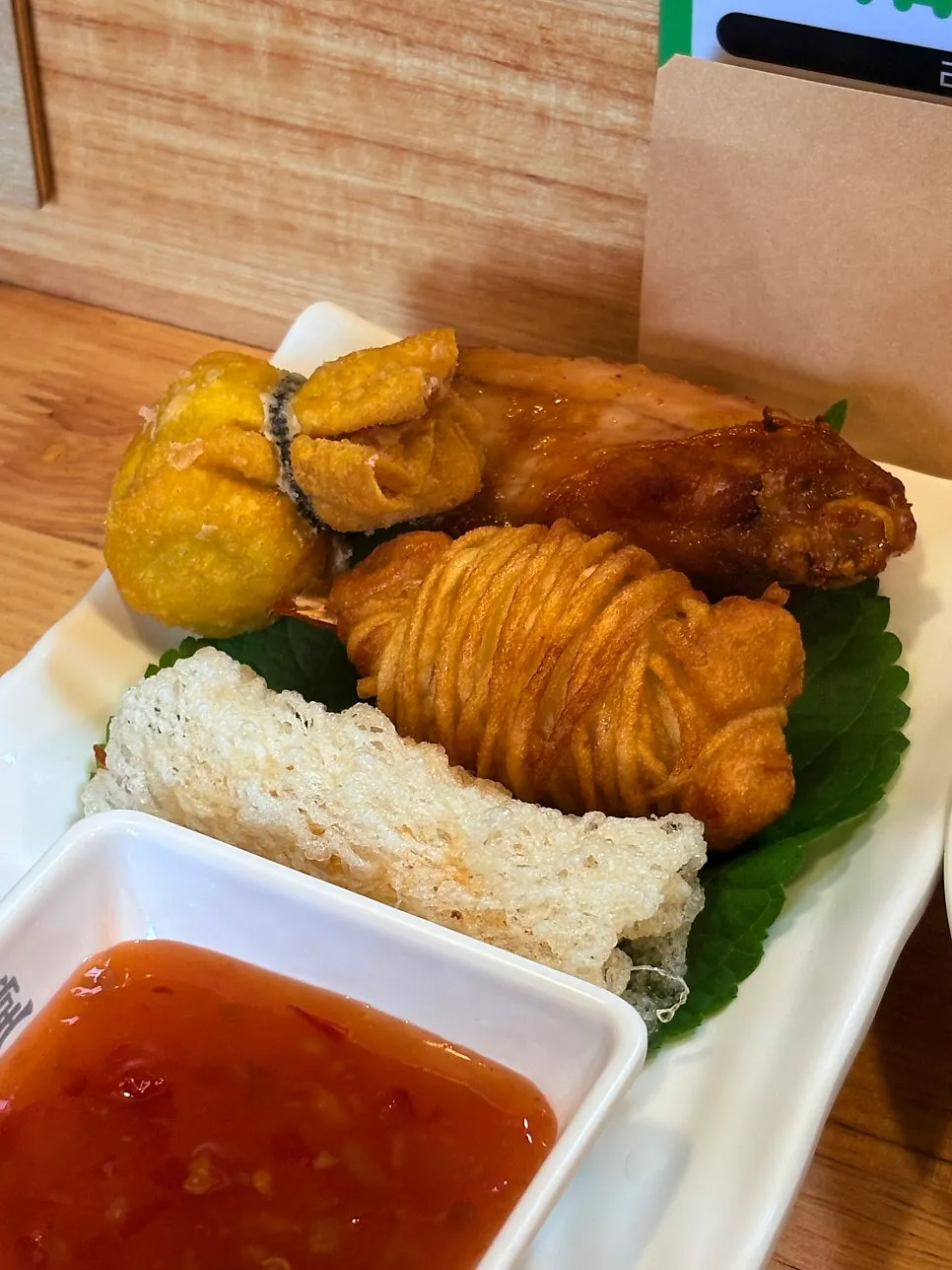 Potato wedges and buffalo wings from the fried platter