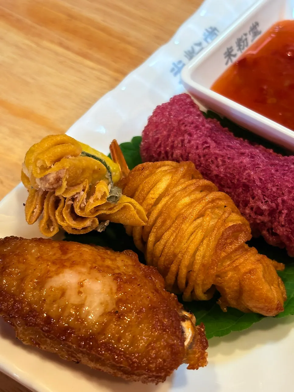 Freshly fried spring rolls with chili sauce