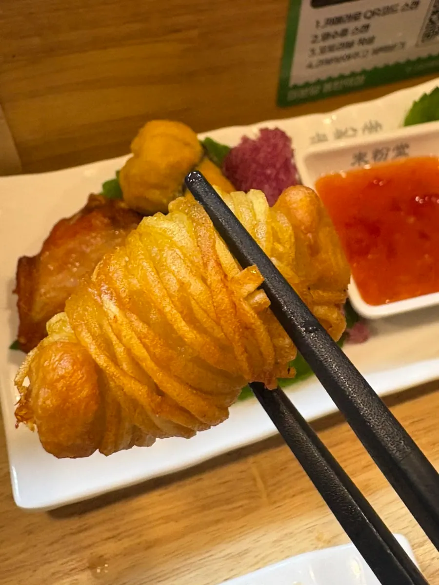 Shrimp wrapped in thin potato strands