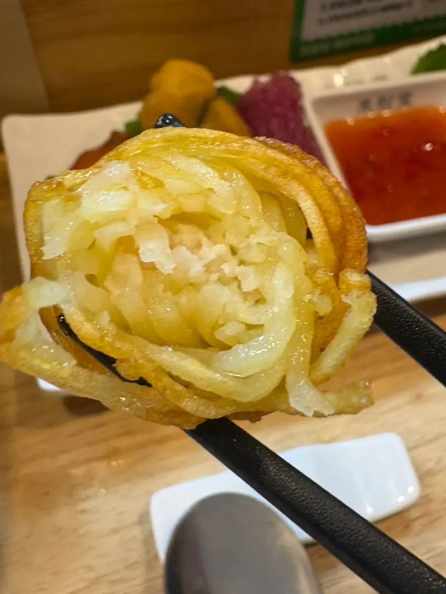 Cross-section of a halved shrimp potato roll