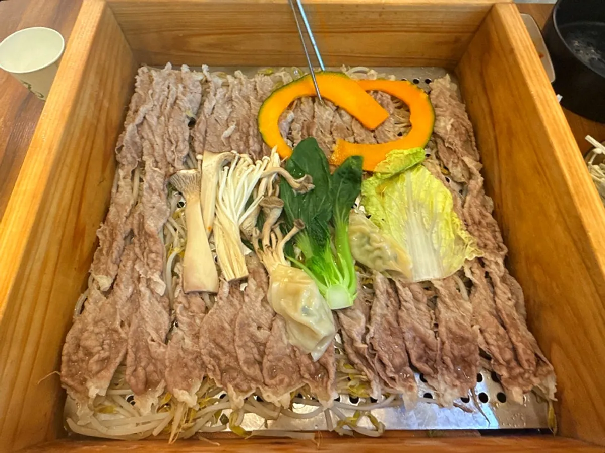 Hinoki steam table setting at Pyeonbaek Hoegwan Dongtan Branch