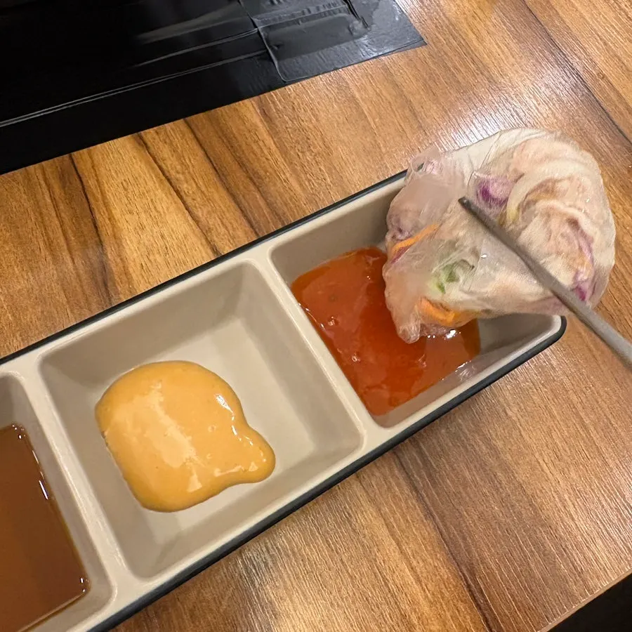 Three types of sauce: soy sauce, peanut sauce, and chili sauce