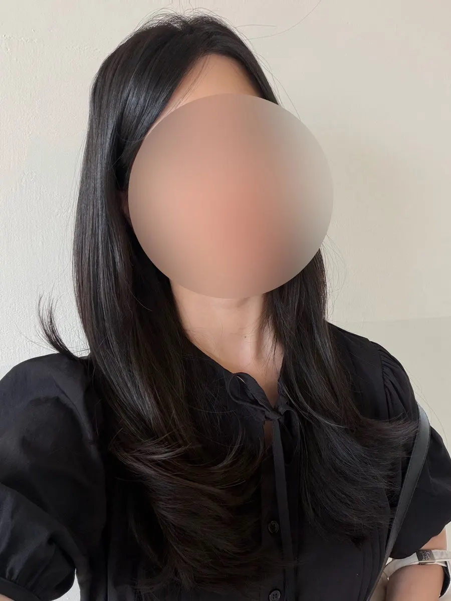 Hair toned down into a calm matte brown