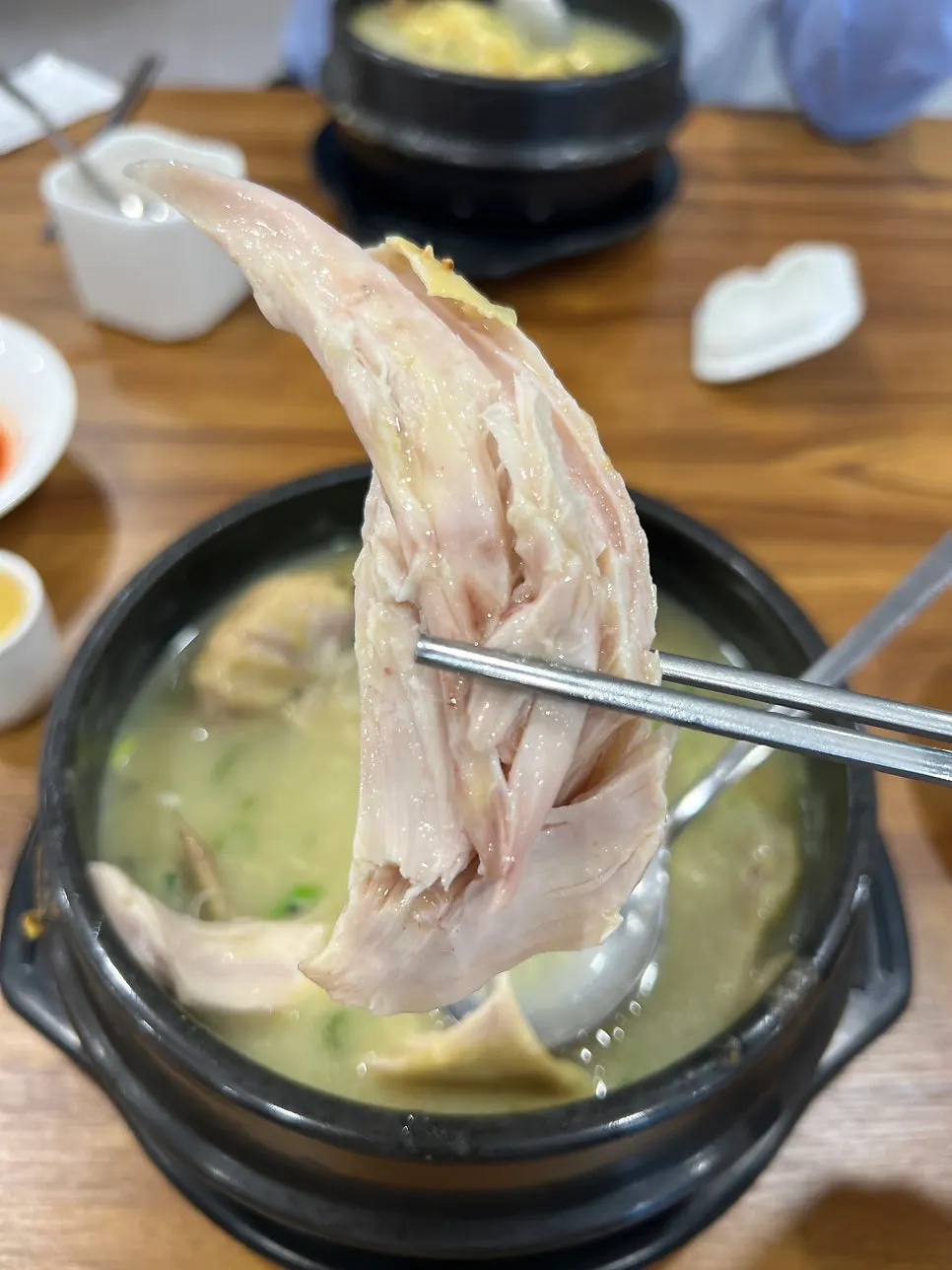 Chicken meat pulled from the samgyetang pot