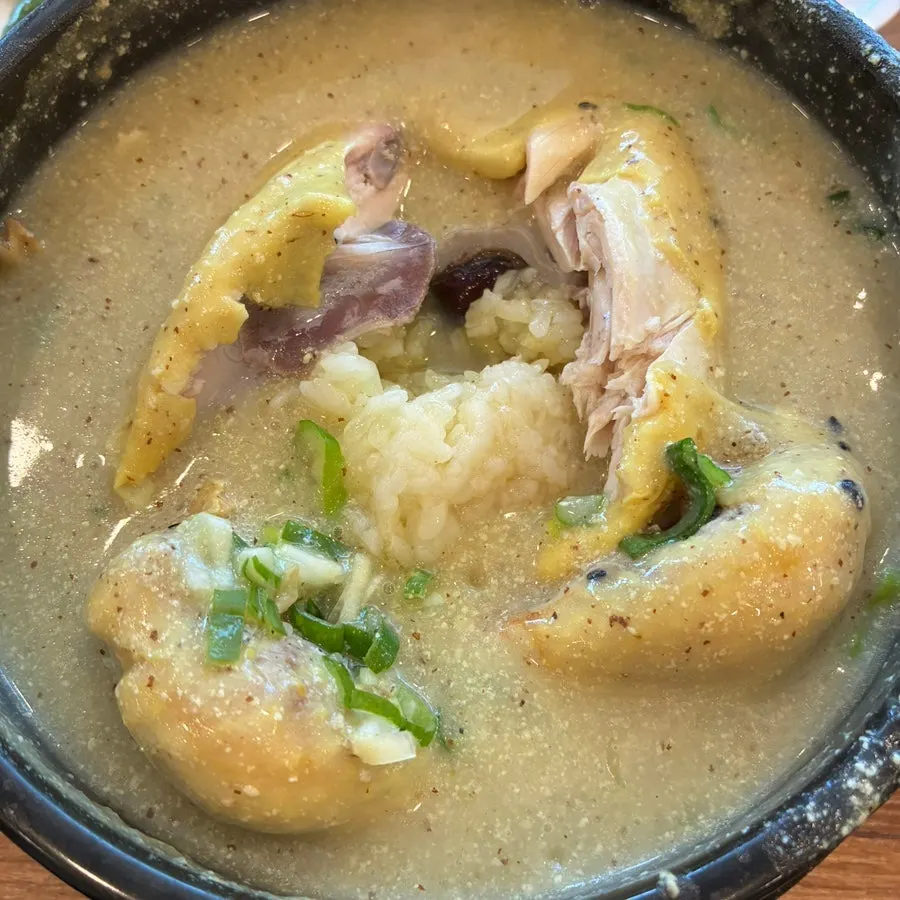 A spoonful of perilla broth and chicken