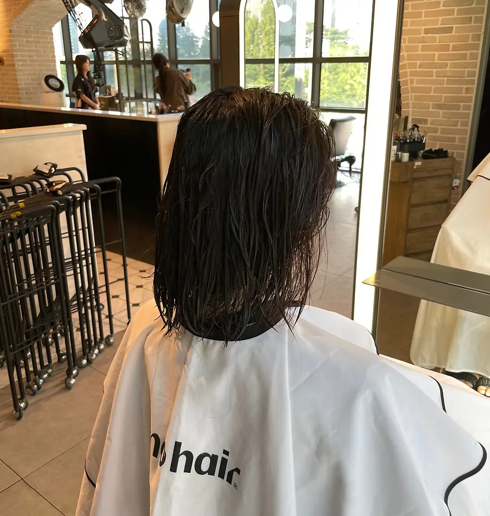 Hair after the second shampoo following softening and heat treatment