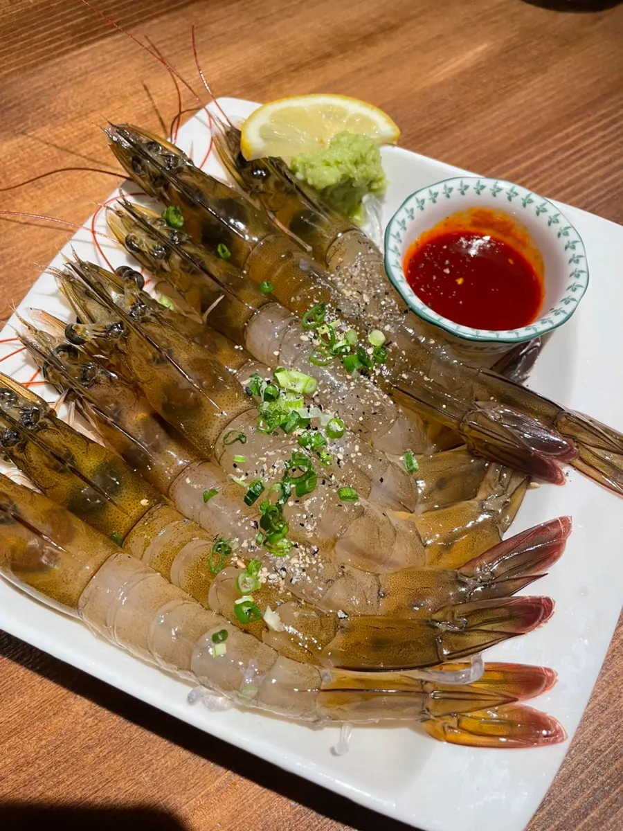 Plate of raw shrimp sashimi