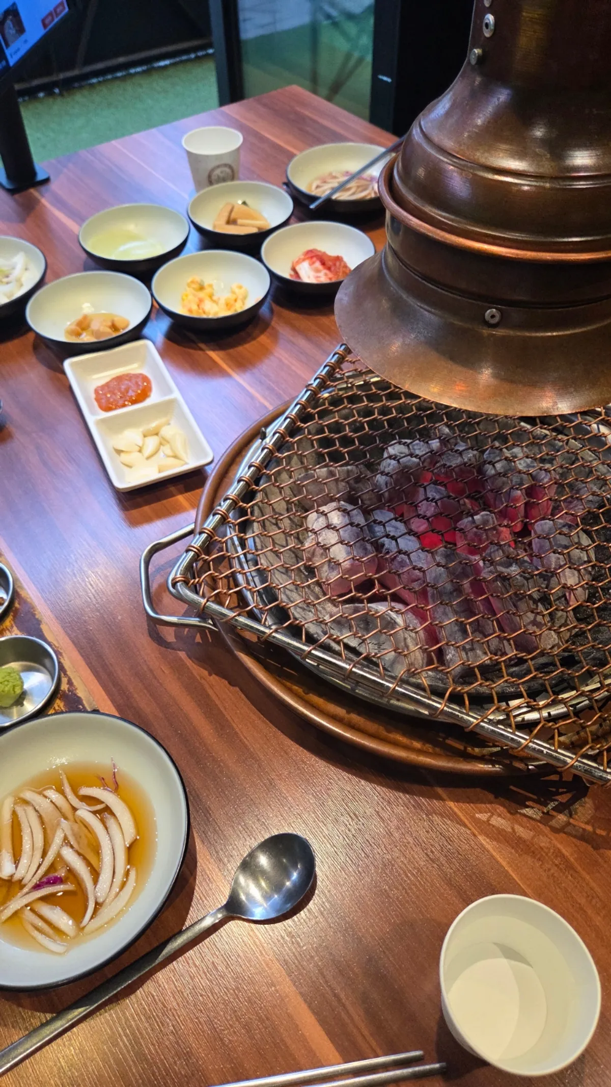 Charcoal BBQ table setting at Grill the Terrace Dongtan Main Branch