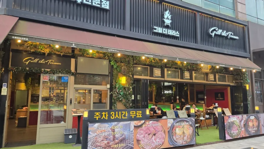 Plant-filled interior of Grill the Terrace Dongtan Main Branch