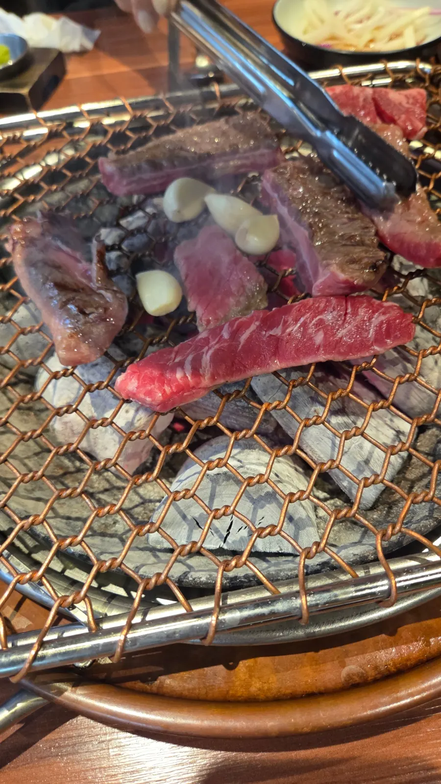 Grilled beef short ribs with side dishes