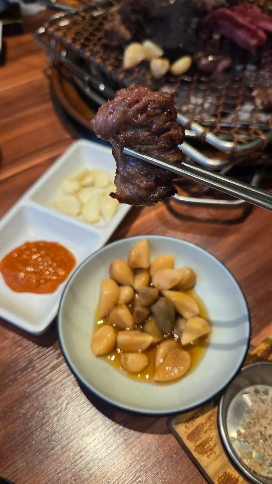 Fully grilled beef ribs with side dishes