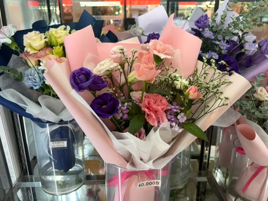 A single flower and small bouquets