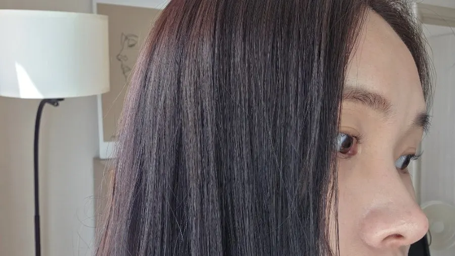 Ash brown hair seen in natural light on day 5 after dyeing