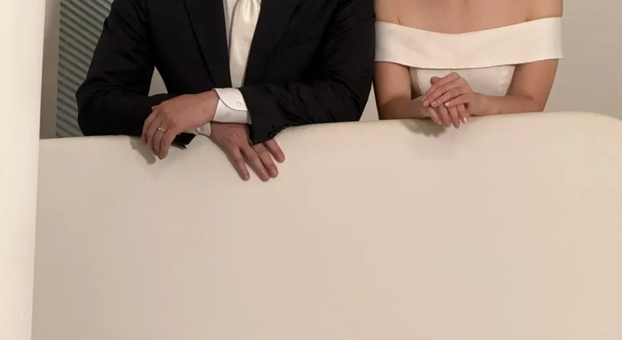 Nails visible in a distant wedding-shoot shot