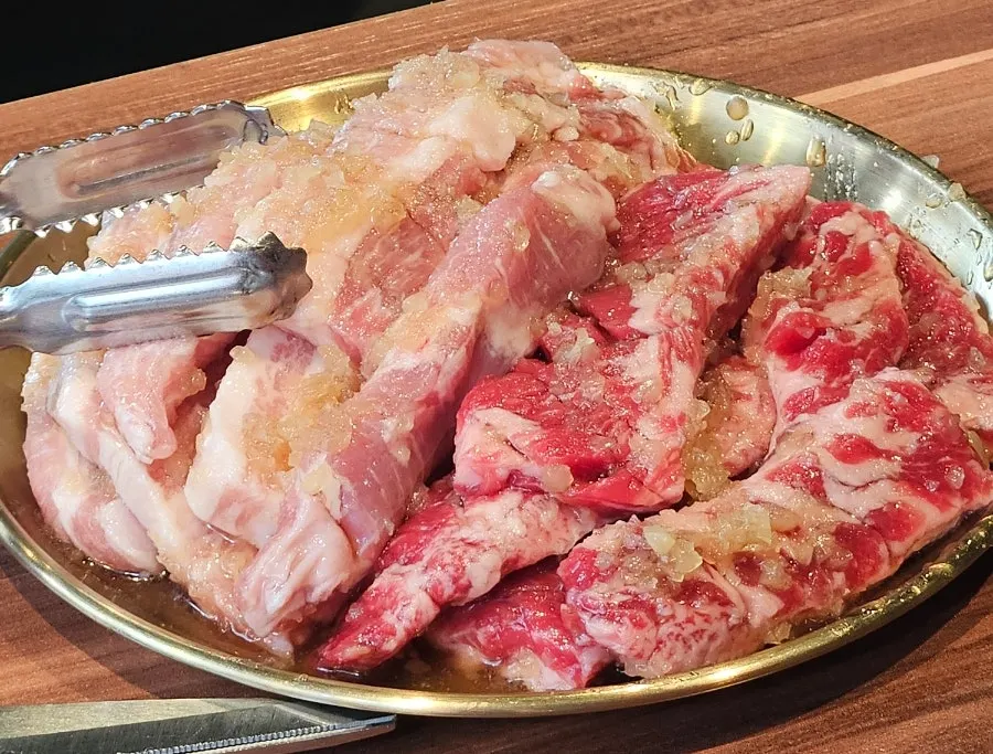 Close-up of a plate of bright red raw meat