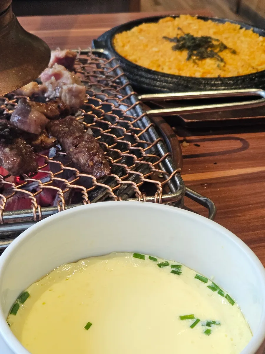 A grilled piece of pork belly and beef