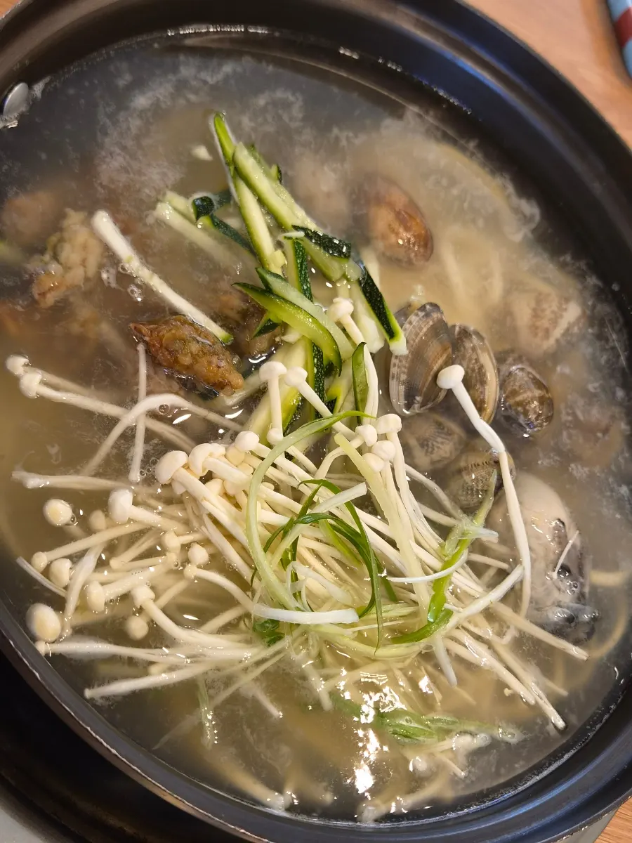 Pufferfish seafood kalguksu loaded with sea squirt and clams