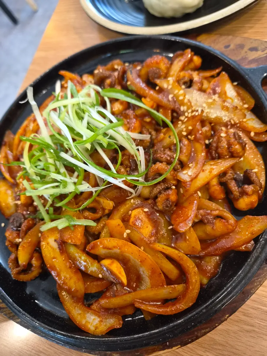 Single serving of grilled webfoot octopus stir-fry
