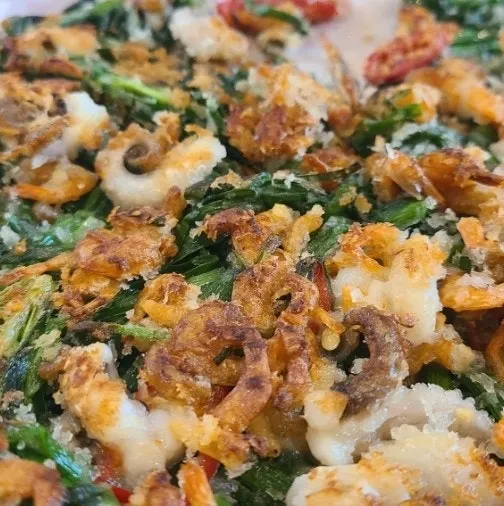 Cross-section of buchujeon showing scallions and seafood