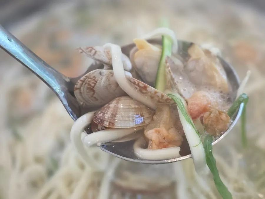 Seafood kalguksu served in a bowl