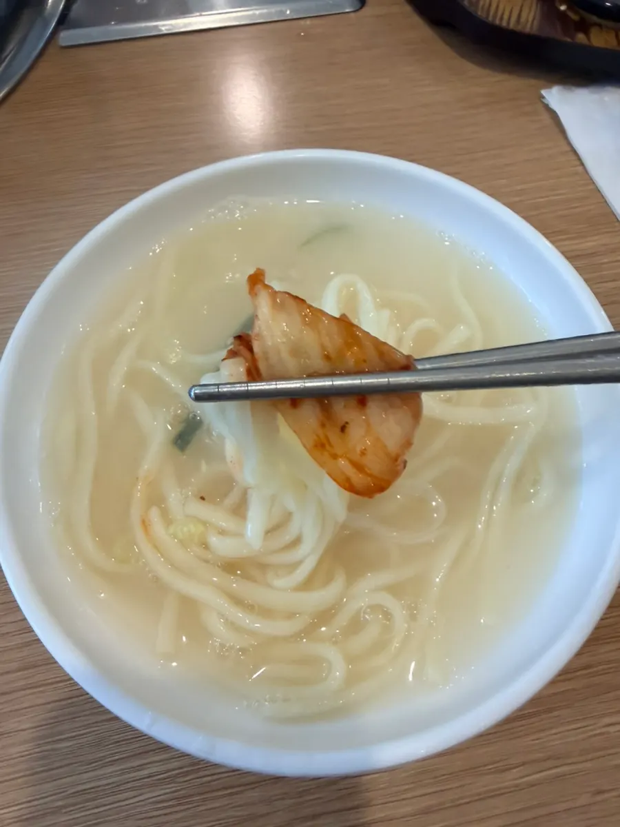 Refreshing seafood kalguksu broth made with pufferfish stock