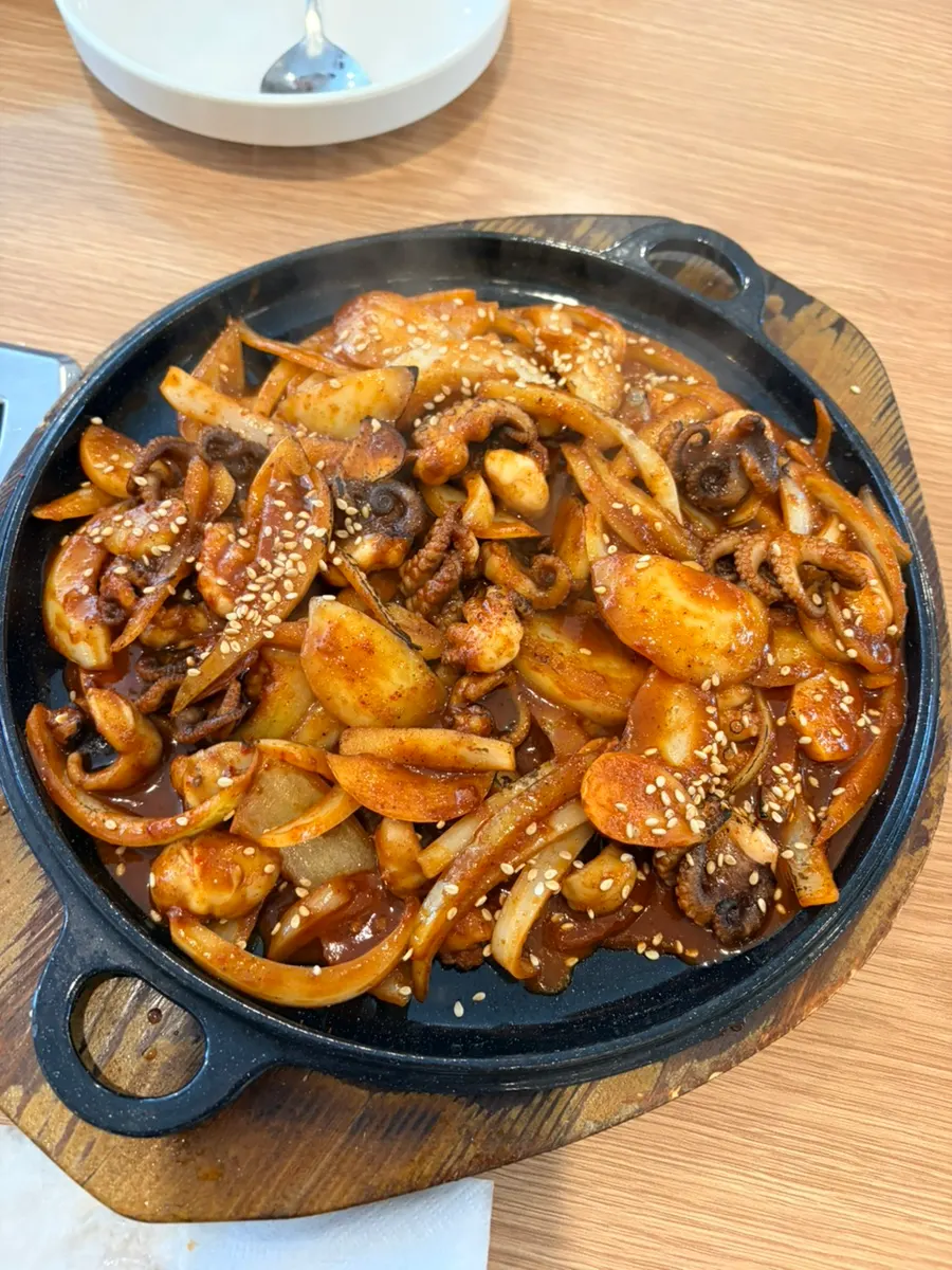 Kalguksu paired with crisp fresh kimchi