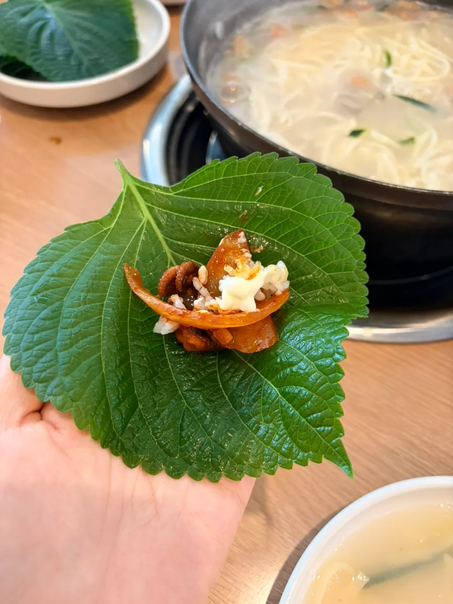 Perilla-leaf wrap with flying fish roe mayonnaise and stir-fried webfoot octopus