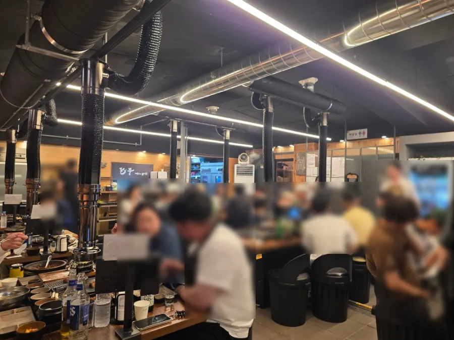 Fully booked interior of Donpu The Grill