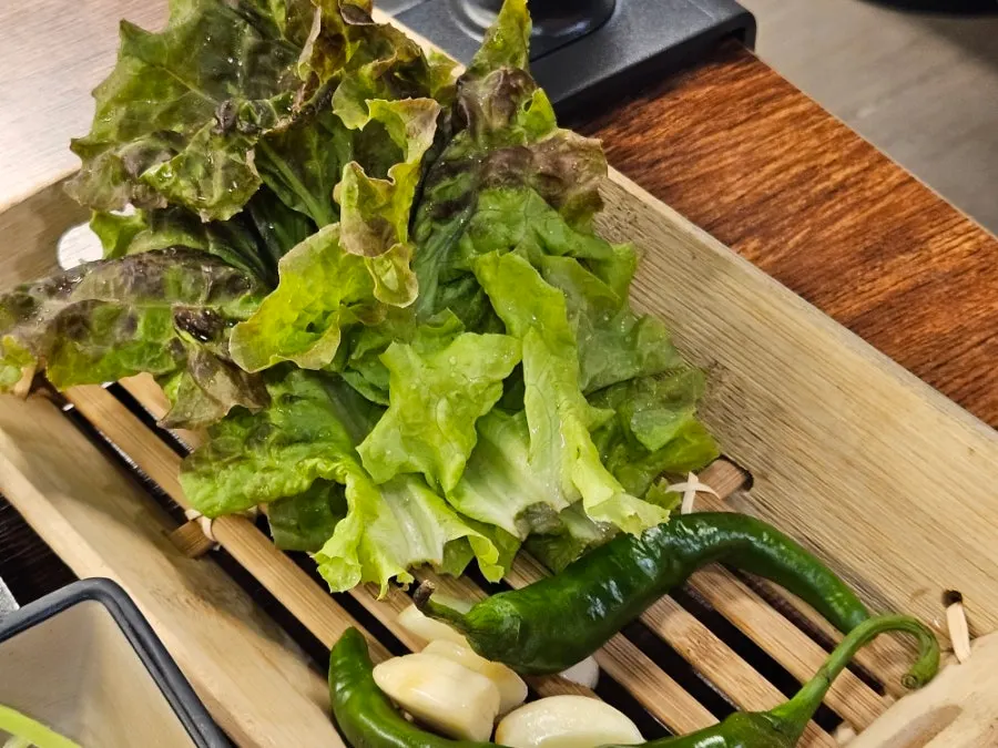Kimchi and pickled radish at the self-serve side dish station