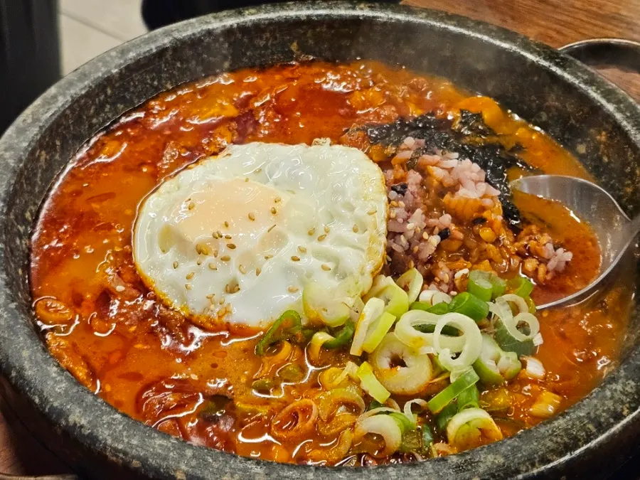 Free stone-pot kimchi rice served as a side