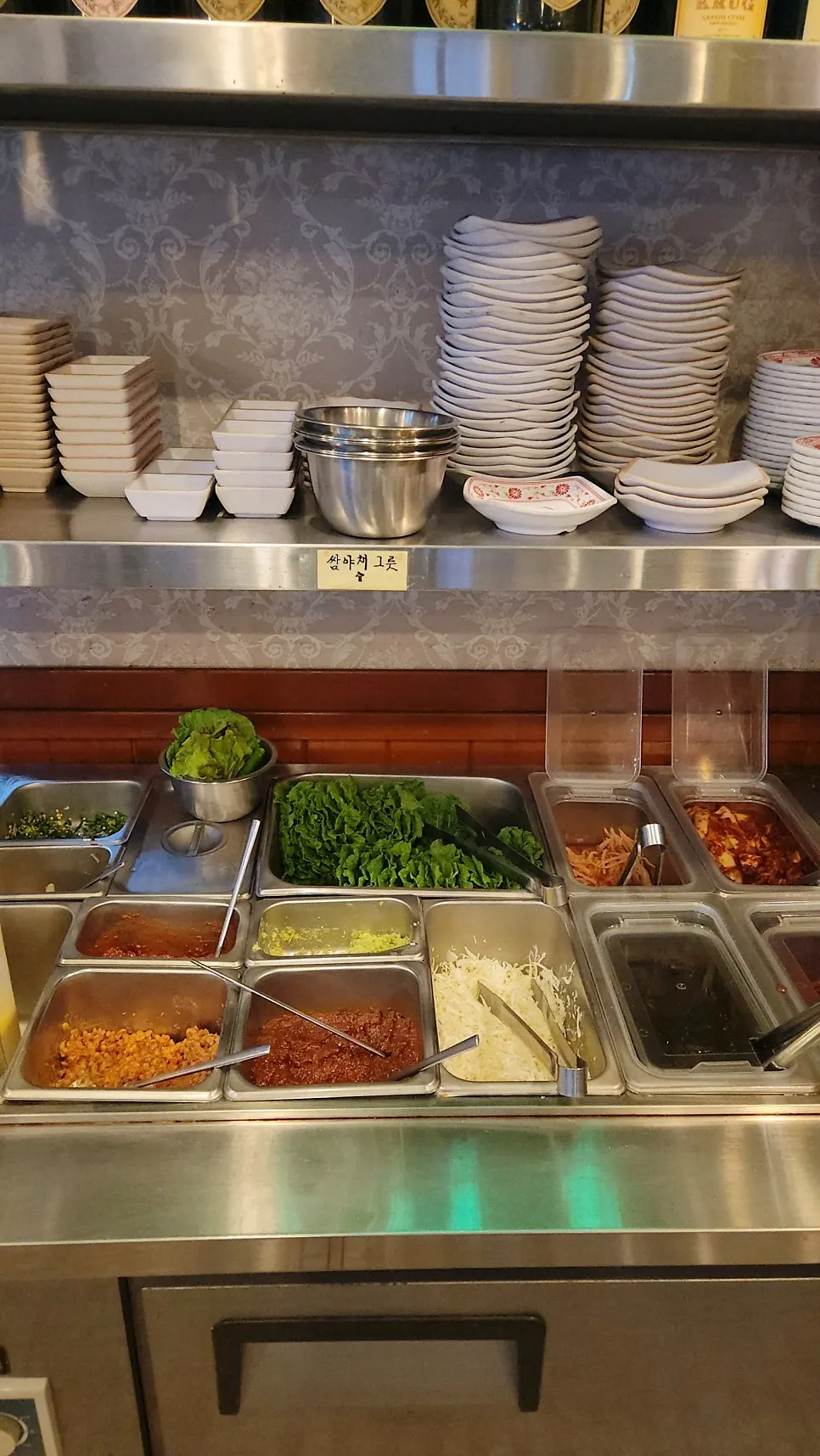 Ice bucket for wine at the self-service corner