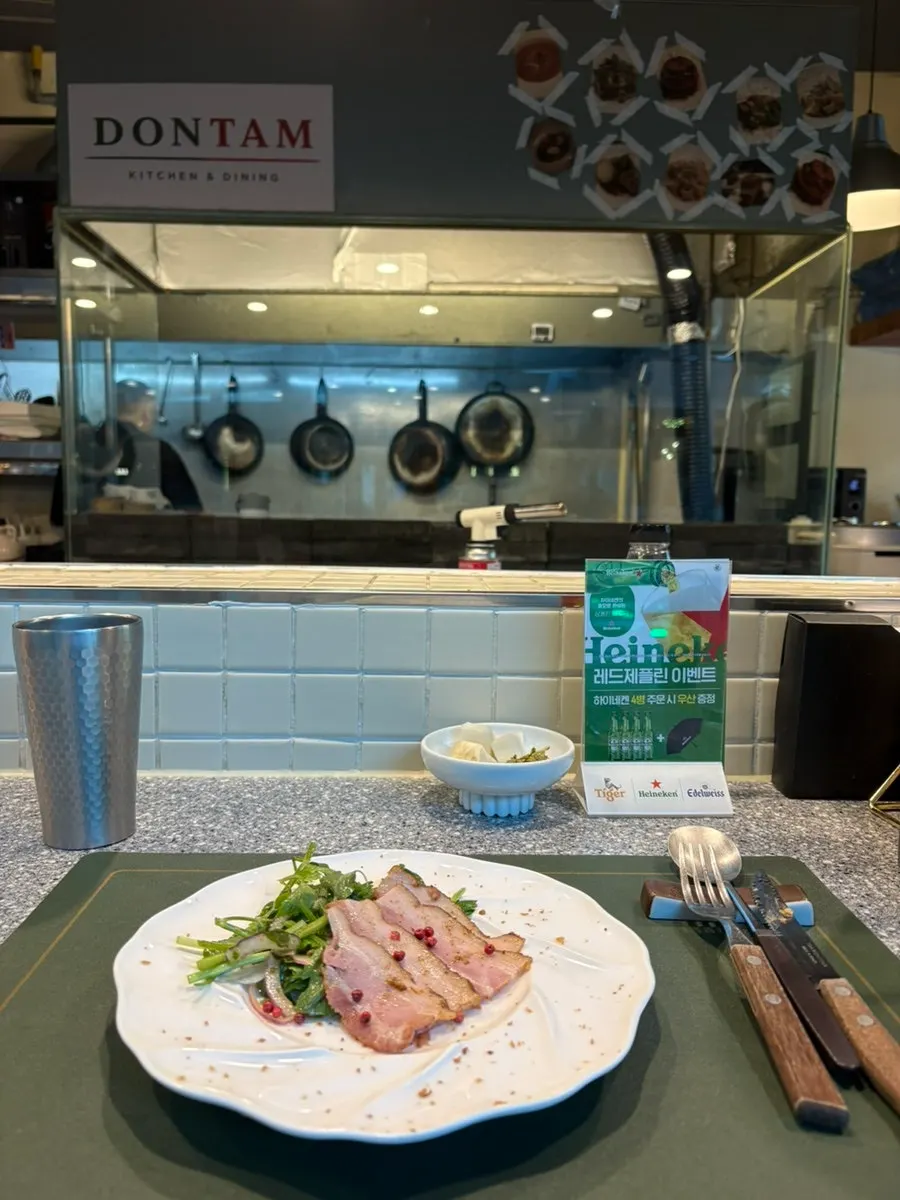Meat plate served with minari salad