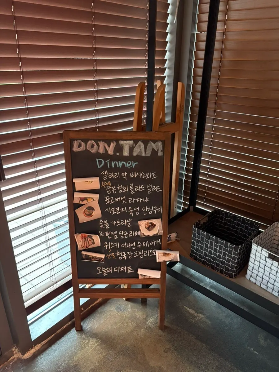 Chef explaining a dish at the bar seating