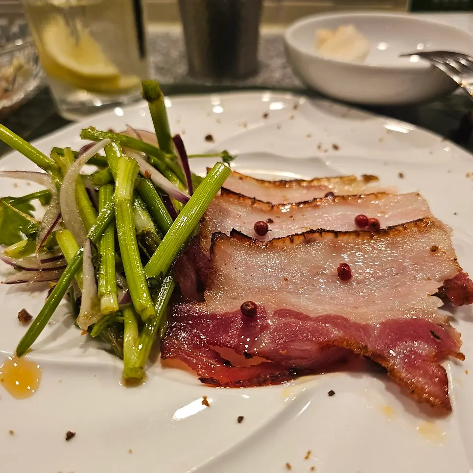 Pork belly with minari, Sichuan pepper, cumin, and fennel main dish
