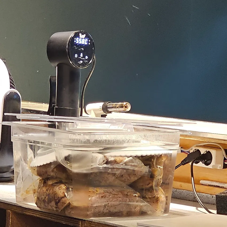 Close-up of the pork being sous vide cooked