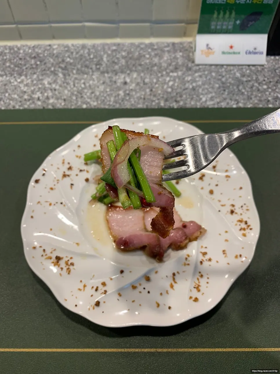 Gabisal served with sauce, onion, and minari