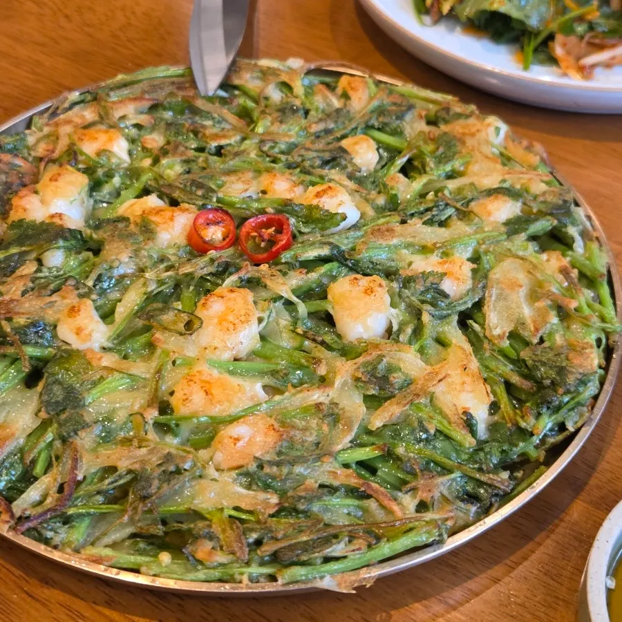 A plate of Doonjeong's shrimp minari jeon