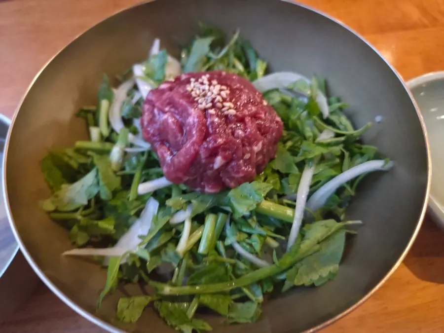 Beef yukhoe bibimbap piled with raw beef