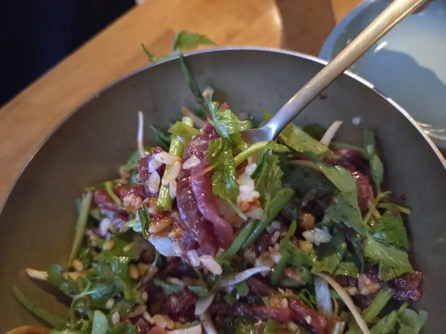 Beef yukhoe bibimbap mixed evenly with ingredients