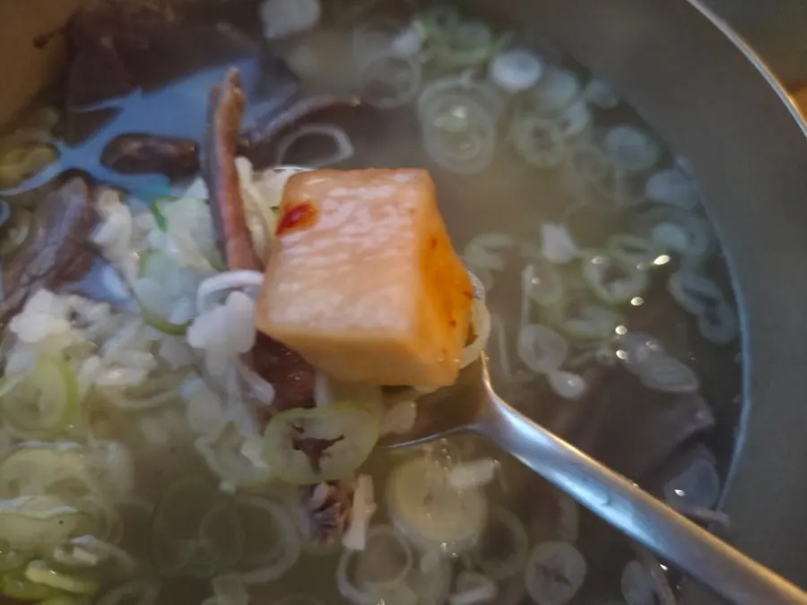 A bowl of beef gomtang loaded with meat