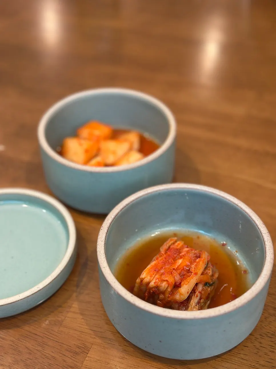 Brass spoons and a neat Korean table setting