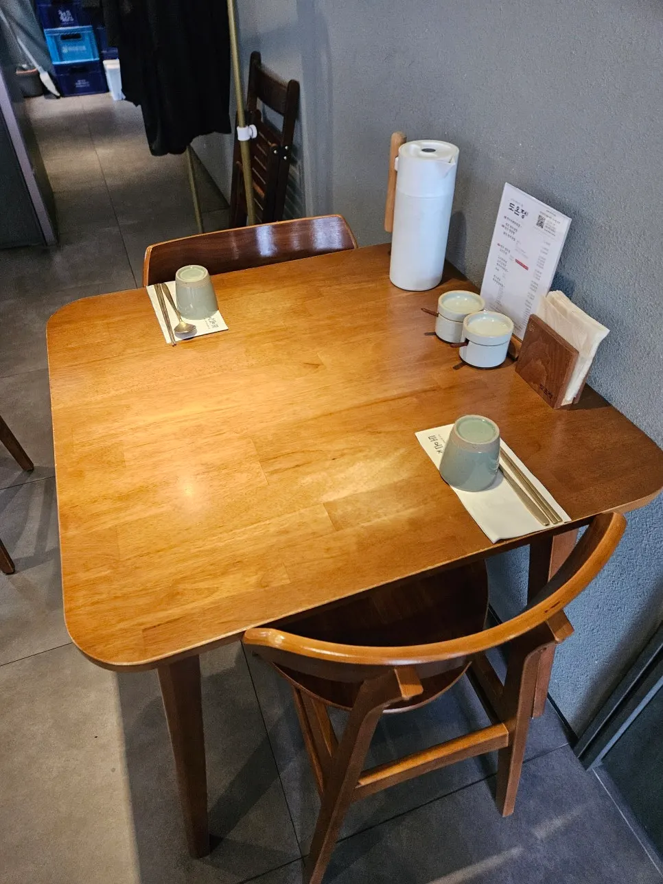 Seating at Doonjeong with a view of the open kitchen