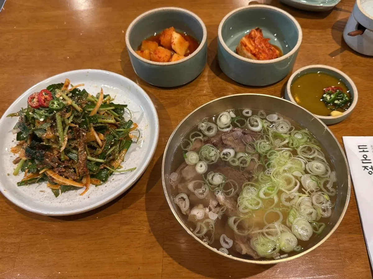 Solo meal spread with gomtang and meat muchim