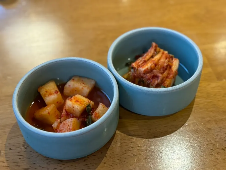 Standard side dishes of diced radish kimchi and cabbage kimchi
