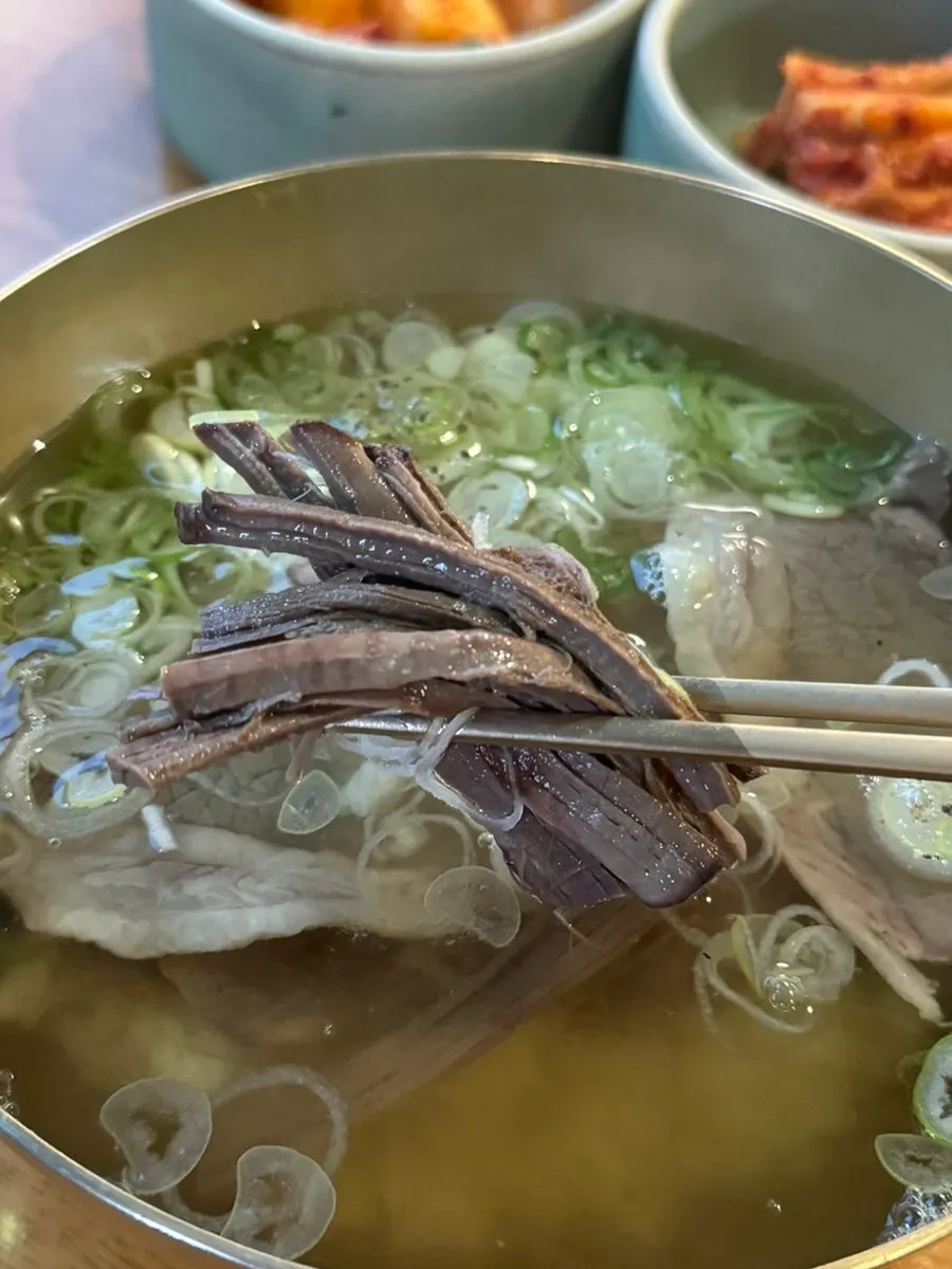 A portion of beef gomtang served out for the child