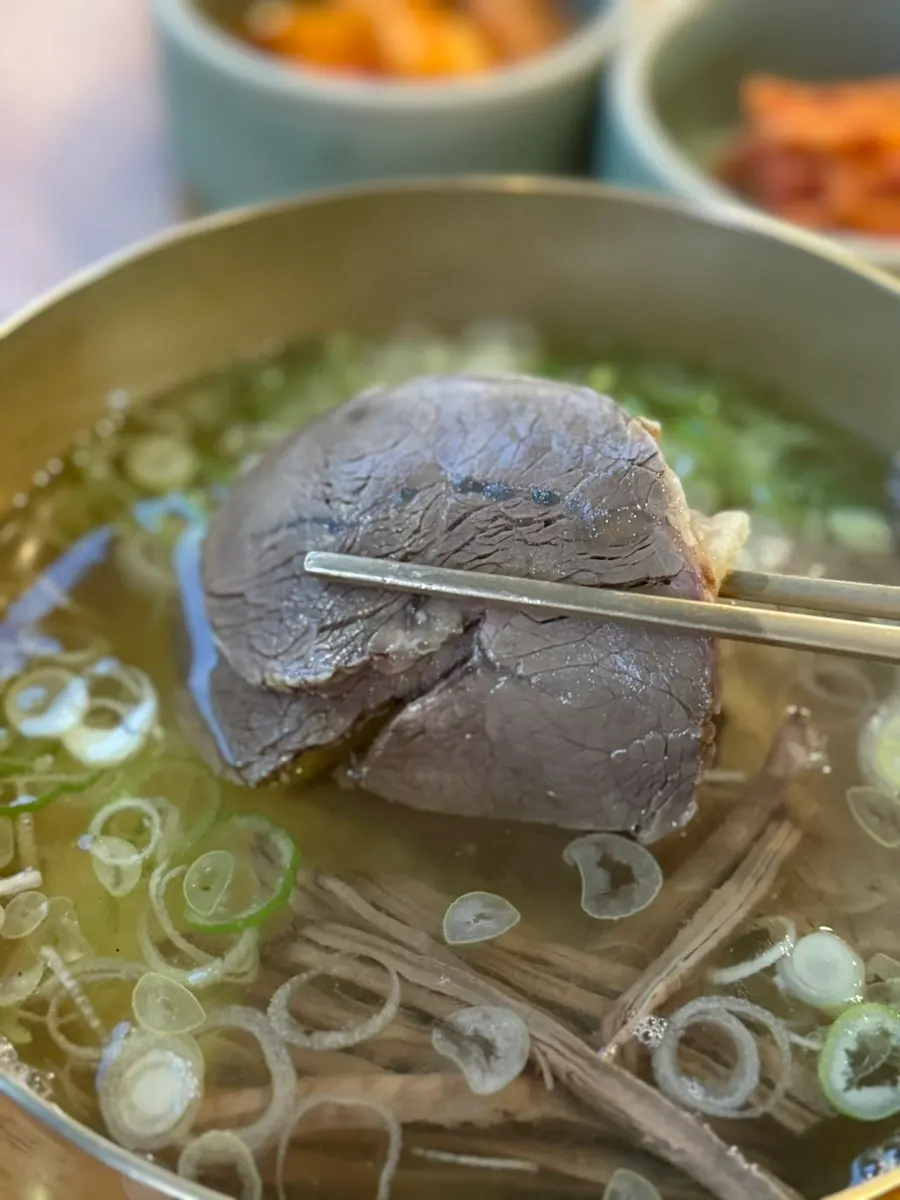 A bowl of beef gomtang eaten together with the child