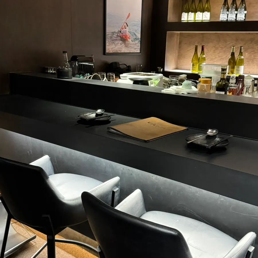 Bar area at Dophan with liquor on display
