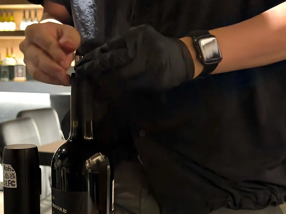 Red wine poured into a glass