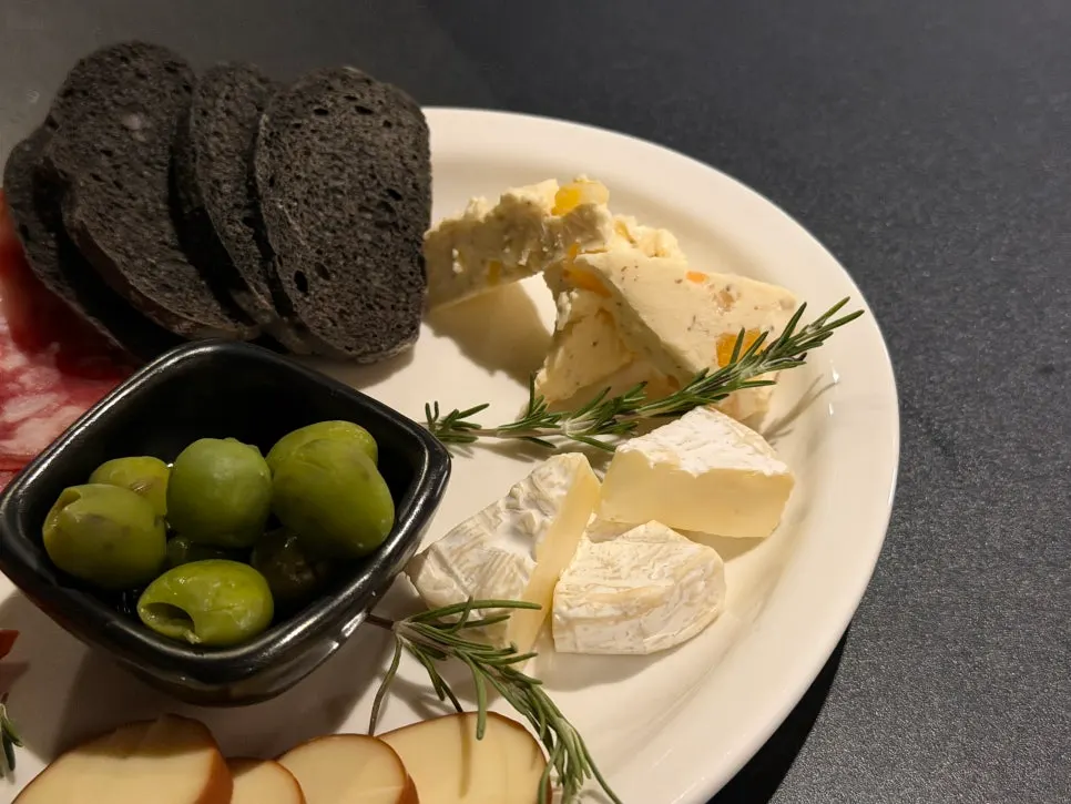 Platter with cheese and olives